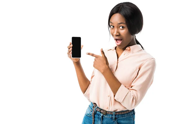 Shocked African American Woman Shirt Pointing Finger Smartphone Isolated White — Stock Photo, Image