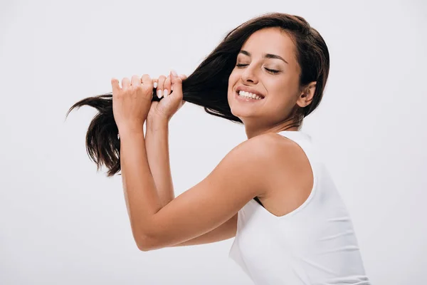 Happy Brunette Beautiful Woman Holding Long Healthy Shiny Hair Isolated — Stock Photo, Image