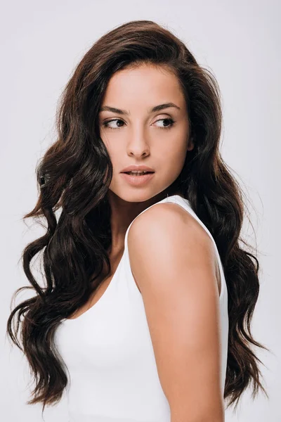 Brunette Beautiful Woman Long Curly Healthy Hair Looking Away Isolated — Stock Photo, Image