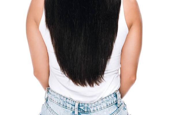 back view of brunette beautiful woman with long healthy and shiny hair isolated on white