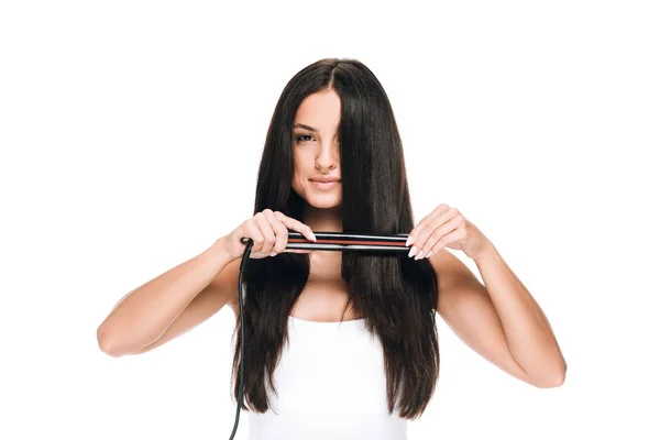 Brunette Beautiful Woman Straightening Long Shiny Hair Flat Iron Isolated — Stock Photo, Image