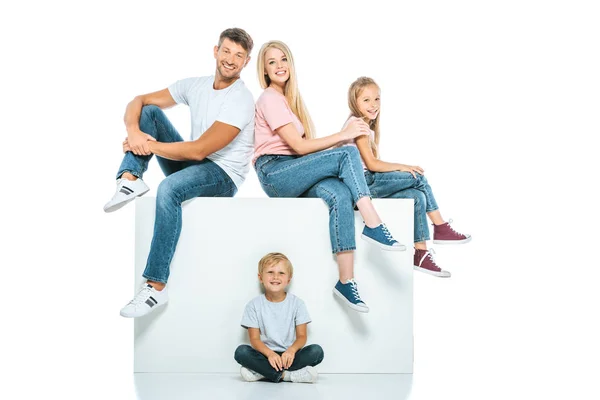 Happy Family Sitting Cube Looking Camera White — Stock Photo, Image