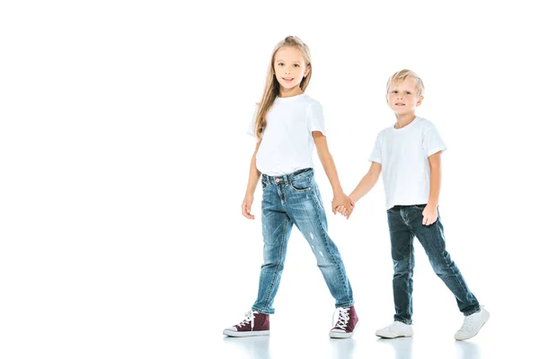 Glückliche Schwester Und Bruder Jeans Halten Händchen Auf Weiß — Stockfoto