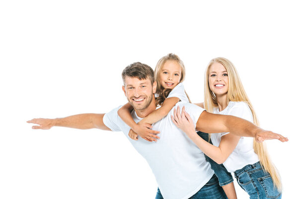 happy father with outstretched hands near daughter and attractive wife isolated on white 