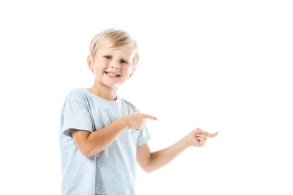 Gelukkig Schattig Jongen Wijzend Met Vingers Geïsoleerd Wit — Stockfoto