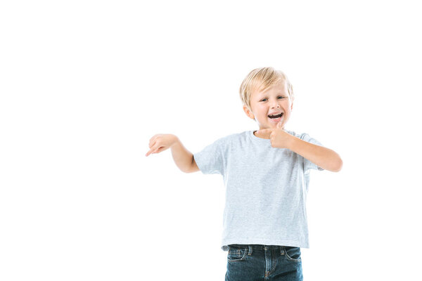 excited boy pointing with finger isolated on white 