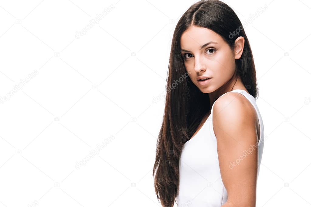 side view of brunette beautiful woman with long straight healthy and shiny hair isolated on white