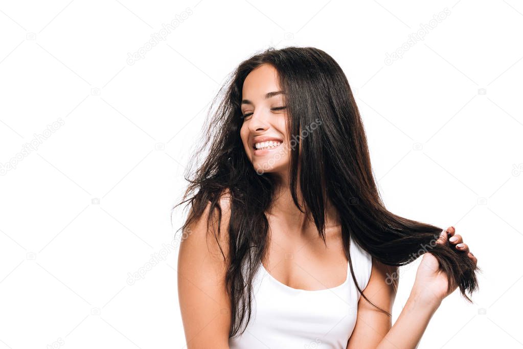 happy brunette beautiful woman with straight and curly hair isolated on white
