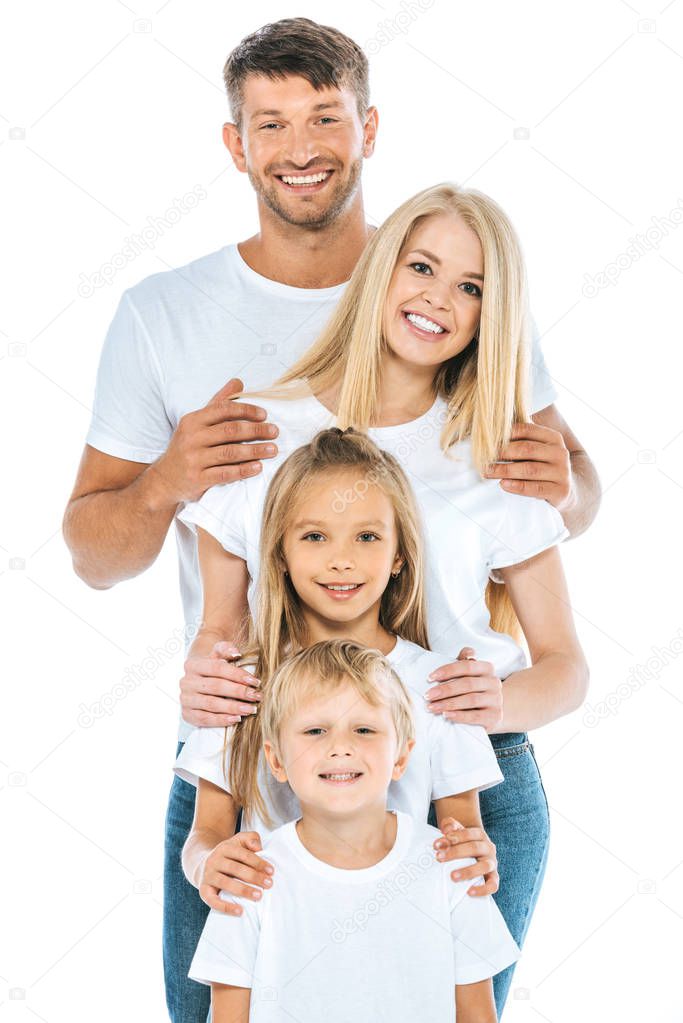 happy children and parents looking at camera isolated on white
