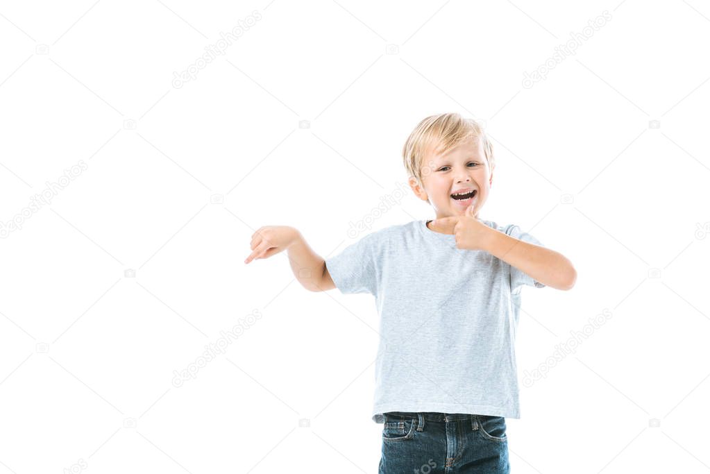 excited boy pointing with finger isolated on white 