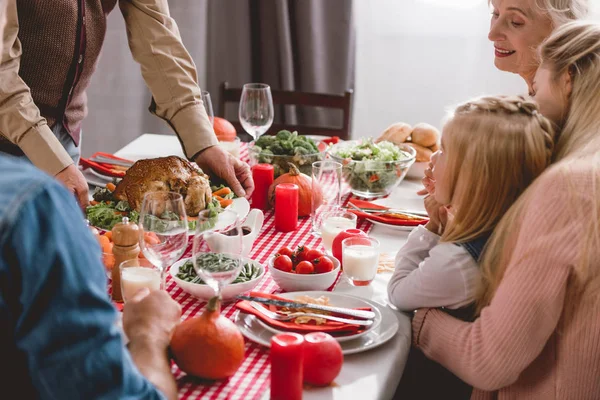 Family Members Sitting Table Grandfather Holding Plate Turkey Thanksgiving Day — Stock Photo, Image