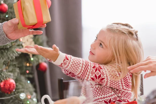 Cropped View Grandfather Giving Christmas Gift His Granddaughter — Stock Photo, Image