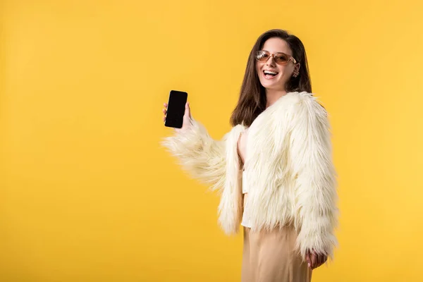 Happy Party Girl Faux Fur Jacket Sunglasses Holding Smartphone Blank — Stock Photo, Image