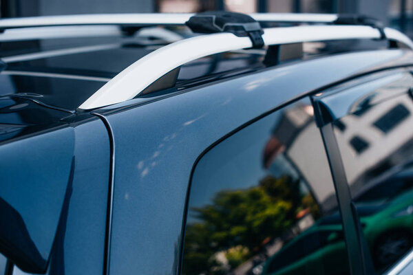 top and side of black, modern polished car