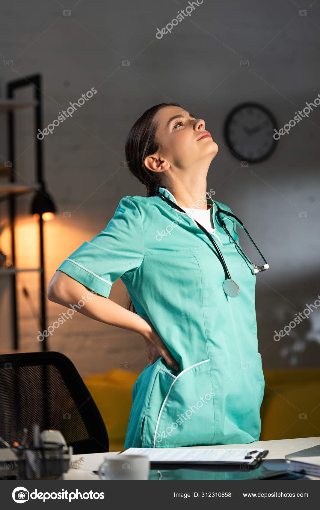 Attractive Nurse Uniform Having Back Pain Night Shift — Stock Photo © AndrewLozovyi 312310858