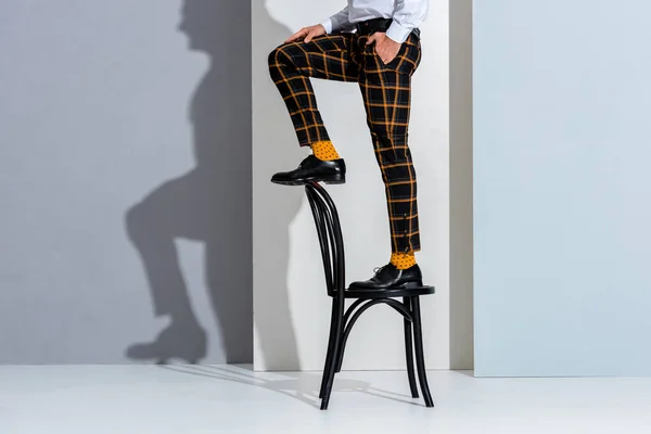 Cropped View Man Standing Chair White Grey — Stock Photo, Image