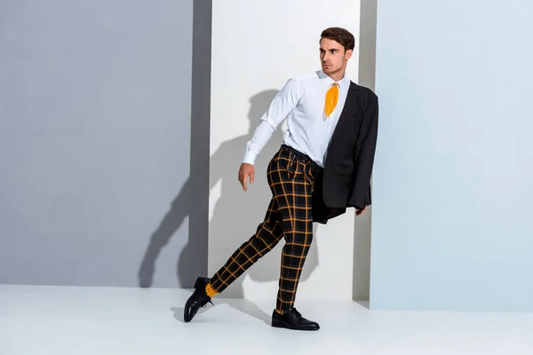 Handsome Man Plaid Trousers Walking Grey White — Stok fotoğraf