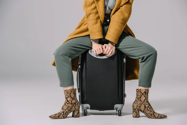 Cropped View Stylish Woman Beige Coat Sitting Travel Bag Grey — Stock Photo, Image