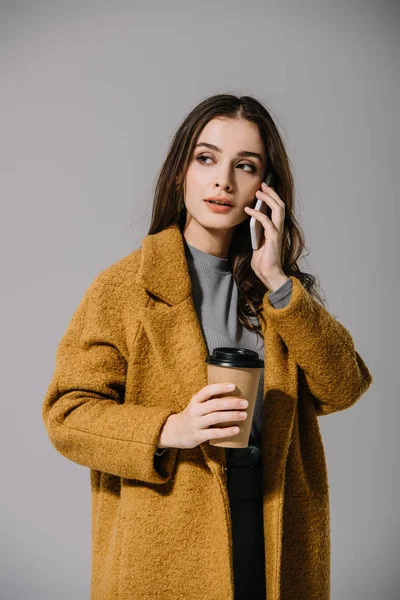 Beautiful Girl Beige Coat Holding Coffee While Talking Smartphone Isolated — Stock Photo, Image