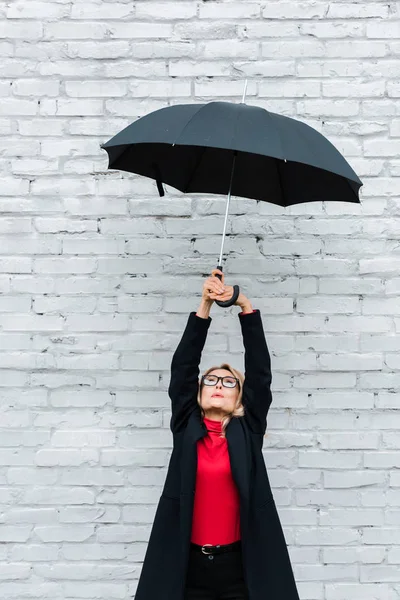 Attractive Blonde Businesswoman Black Coat Holding Umbrella — Stock Photo, Image