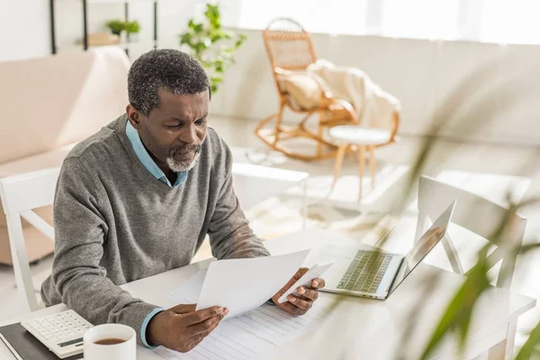 Selective Focus Senior African American Man Looking Utility Bill While — Stock Photo, Image