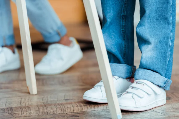 Cropped View Kids Denim Jeans White Sneakers — Stock Photo, Image