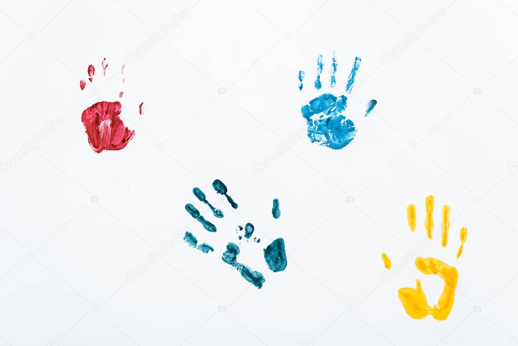 yellow, blue and red hand prints on white 
