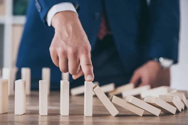 Partial View Risk Manager Blocking Domino Effect Falling Wooden Blocks — Stock Photo, Image