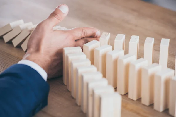 Partial View Risk Manager Protecting Wooden Blocks Domino Effect — Stock Photo, Image