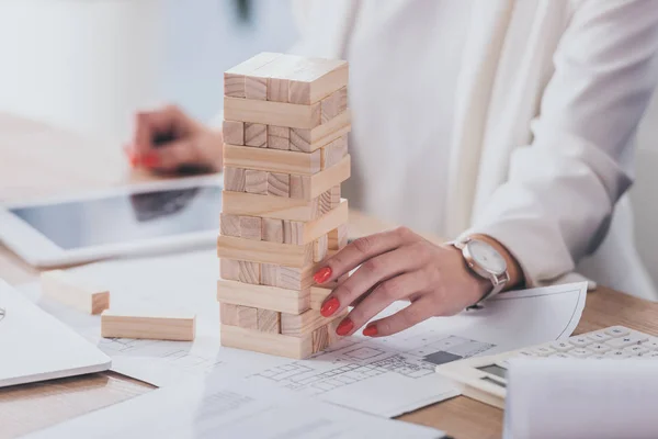 Cropped View Businesswoman Touching Stack Wooden Blocks — Stock Photo, Image