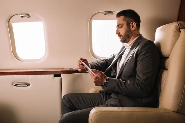 Side View Handsome Businessman Suit Using Smartphone Private Jet — ストック写真