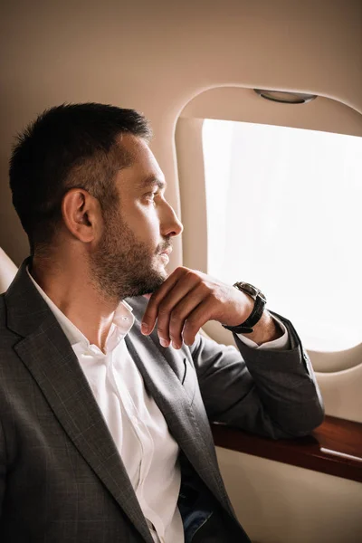 Handsome Bearded Businessman Looking Airplane Window Private Jet — Stock Photo, Image