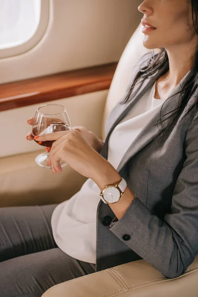 Cropped View Businesswoman Formal Wear Holding Glass Cognac Private Jet — ストック写真