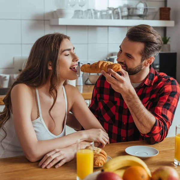 Handsome Man Feeding Attractive Girlfriend Delicious Croissant Orange Juice Fresh — Stock Photo, Image