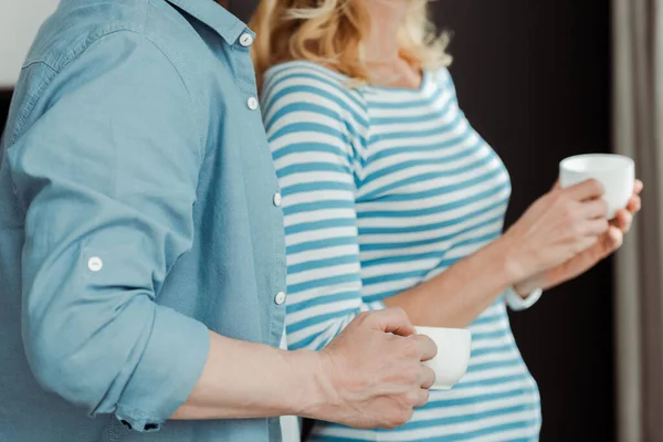 Cropped View Man Holding Cup Coffee Wife Home — Stock Photo, Image