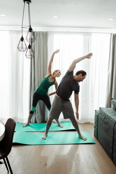 Mature Man Training Smiling Wife Fitness Mats Home — Stock Photo, Image