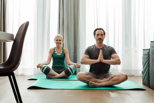 Selective Focus Mature Man Practicing Yoga Smiling Wife Fitness Mats — Stock Photo, Image