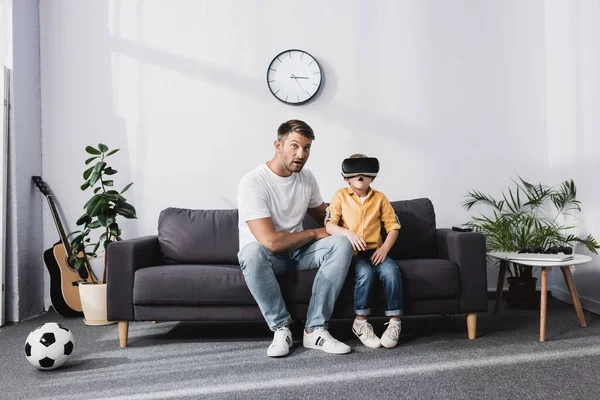 Handsome Man Excited Son Headset Sitting Sofa Home — Stock Photo, Image