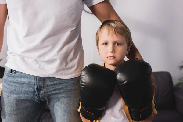 Cropped View Father Touching Shoulder Cute Serious Son Boxing Gloves — Stock Photo, Image