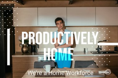 pensive mixed race man standing near coffee cup, book, headphones, laptop and productively home, were a home workforce lettering  clipart