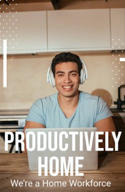 smiling bi-racial man listening music in headphones and using laptop near productively home, were a home workforce lettering  clipart