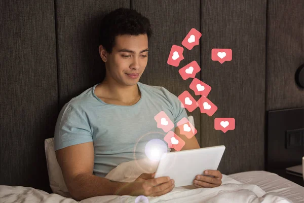 Bonito Misto Raça Homem Usando Digital Tablet Perto Virtual Corações — Fotografia de Stock