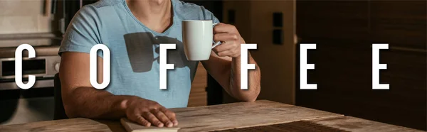 Panoramic Orientation Man Holding Cup Book Coffee Lettering Home — Stock Photo, Image