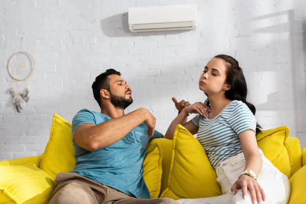 Handsome Man Blowing Girlfriend While Feeling Hot Living Room — Stock Photo, Image
