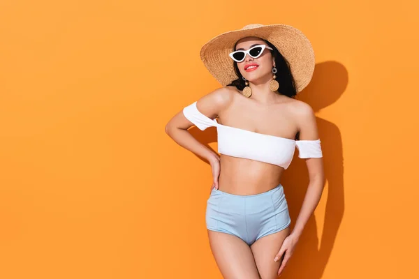 Happy Girl Swimsuit Sunglasses Straw Hat Standing Hand Hip Orange — Stock Photo, Image