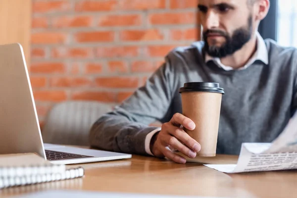 Selective Focus Handsome Businessman Looking Laptop While Holding Newspaper Paper — Stock Photo, Image