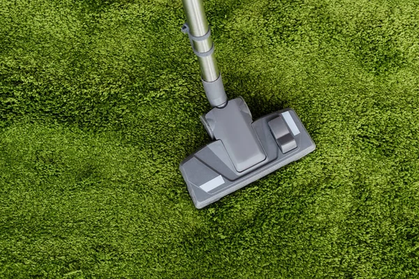 Top View Vacuum Cleaner Green Carpet — Stock Photo, Image