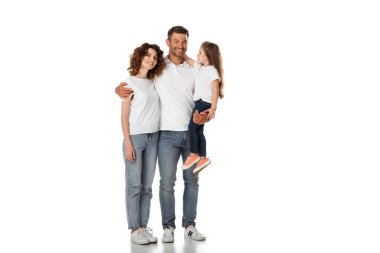 happy father holding in arms cute daughter and hugging curly wife on white clipart