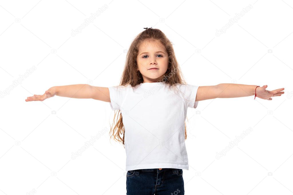 cute kid in white t-shirt standing with outstretched hands isolated on white 