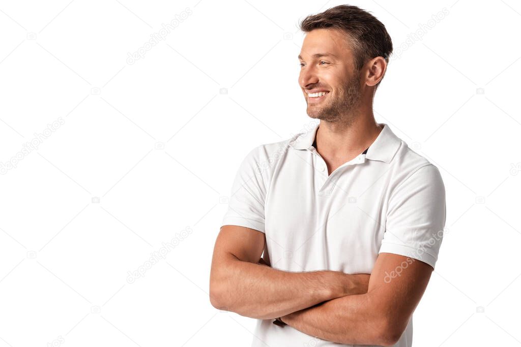 happy man in white t-shirt standing with crossed arms isolated on white 